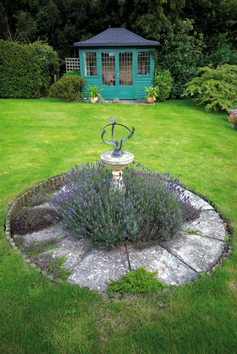 Lavender surrounds a small sundial