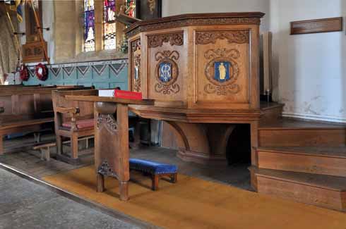 Inside the 15th century church, there is a 14th century Font with its 12th century base, as well as this a 20th century wooden pulpit, which makes for a historically interesting, if not always aesthetically harmonious, mix of styles.