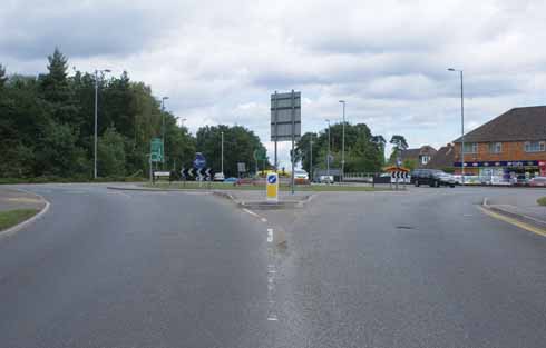 It is interesting to note how much the road has been raised at the south-westerly of the two roundabouts at Tricketts Cross since the older picture was taken in the 1920s. 