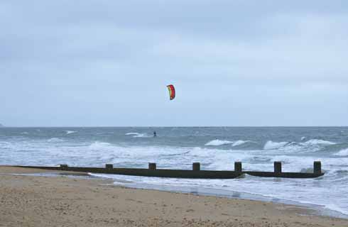 1110edBmth3 Surf’s up! The new reef has undoubtedly improved the surfing on Boscombe Beach, even if it has not lived up to some of the claims made for it in the planning stage.