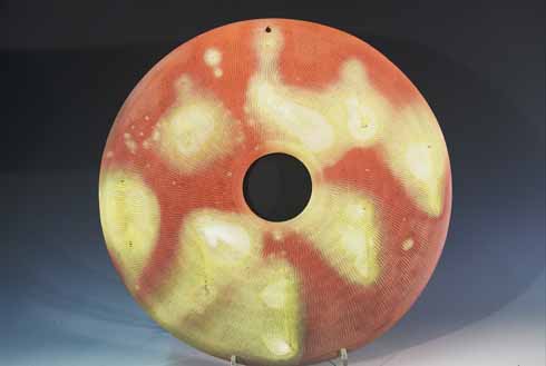 Disc by Jonathan Garratt, who is still active at his Hare Lane Pottery between Cranborne and Alderholt