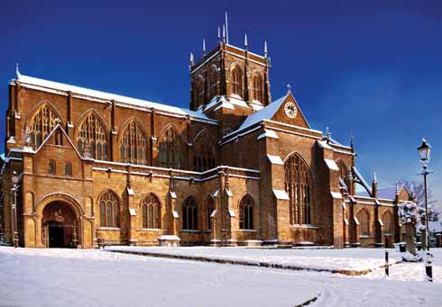 A suitably snow-bedecked Sherborne Abbey at Christmas time