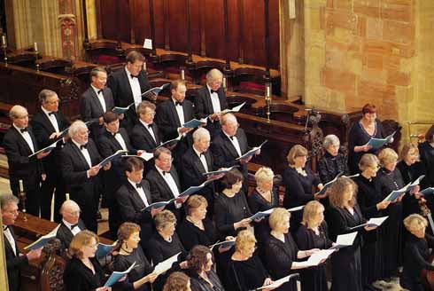 The Chamber Choir helps out during holidays and at the Midnight Mass, when the boys are home asleep