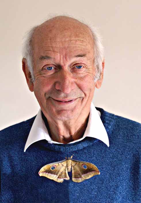 Philip Howse, with a friend, whose wings each contain a transparent window to make it look as if it has eyes