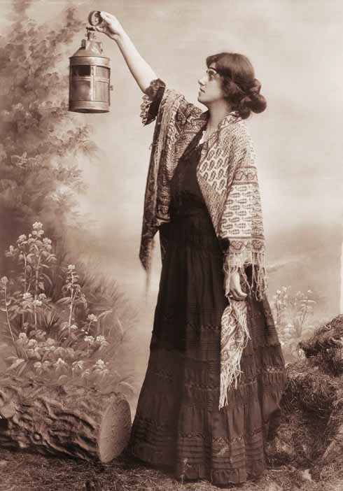 Norrie Woodhall’s elder sister, Gertrude Bugler, in a still photograph celebrating a performance by the original Hardy Players.