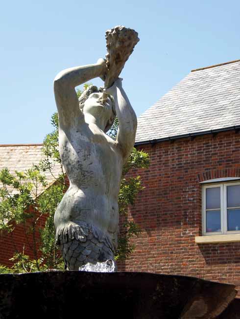 Poundbury is full of architectural touches, like the fountain shown here.