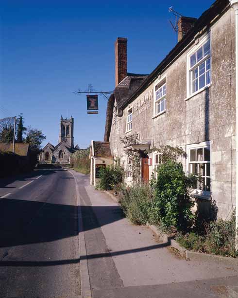 311edTESS1 Marnhull was Hardy’s Marlott, where, in the Pure Drop Inn ‘there’s a pretty brew in tap’. Little altered since Hardy’s time, and with a ‘Pure Drop’ bar, the Crown Inn is the ‘Pure Drop’ of Tess, and figures many times in the book.