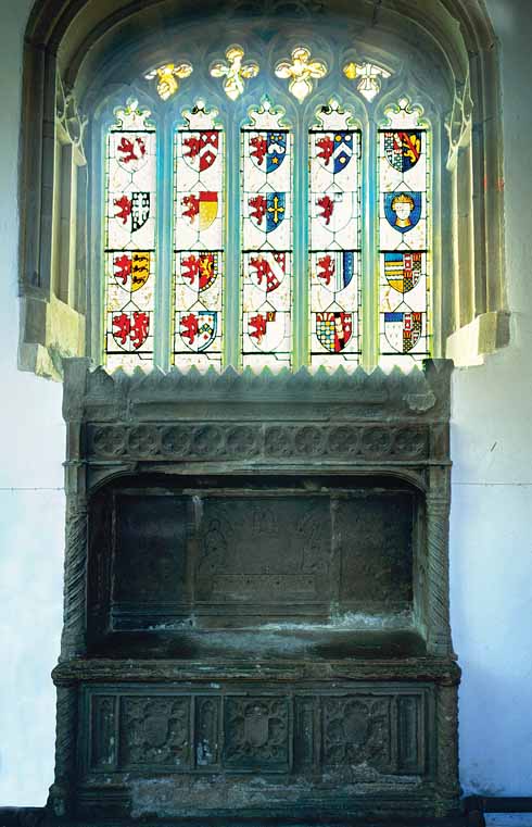 311edTESS8 The real-life Turberville family’s coat of arms in Bere Regis church, with the Purbeck marble tomb immediately below it. According to Tess’s father, John Durbeyfield: ‘Under the church of that there parish lie my ancestors – hundreds of ‘em – in coats of mail and jewels.’