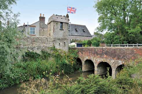 411edMaidenNewton4 Standing sentinel over the final few yards of the River Toller, or Hooke, the former Castle Inn/Hotel was, despite its name, never a castle, but rather the <i>folie de grandeur</i> of a publican.