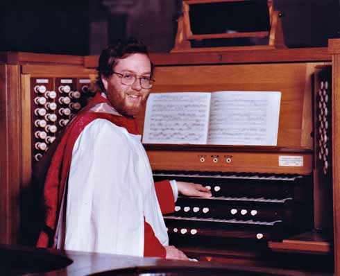 Michael at the organ of Wimborne Minster, where he was Assistant Organist for seven years