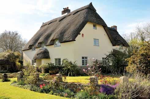 This splendid house is known as Well Cottage, on account of the thatched well within its grounds
