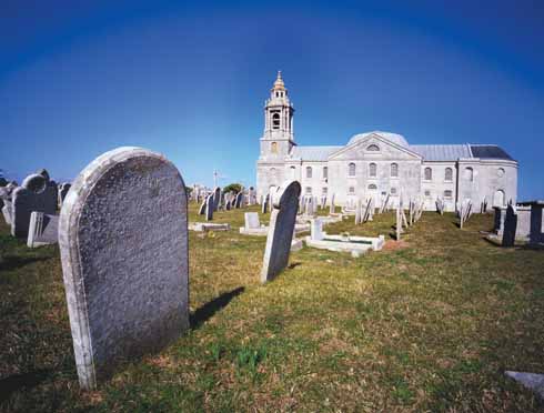 Below St George, Reforne, Portland. Purportedly a homage to St Pauls Cathedral, this massive cruciform layout church was designed by local mason, Thomas Gilbert, and built between 1754 and 1766. 