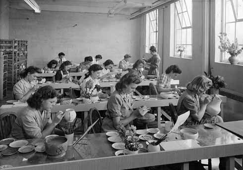 811edPoole 2 Paintresses at work in 1949. The figure standing is Ruth Paveley, head paintress, who came to play a significant design role as well. From Poole Pottery by Leslie Hayward, edited by Paul Atterbury and published by Richard Dennis Publications