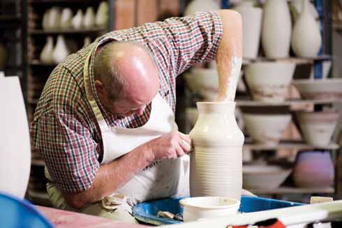 811edPoole 3 Masterpotter, Alan White, at work at Poole Pottery
