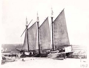 The Dutch sailing ship Neptunus from Groningen offloading lumber at West Bay in 1913 