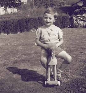 Roger, astride a hobby horse, albeit a foal, as a child