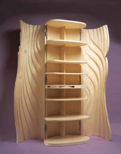 A John Makepeace creation: a cupboard with wings, which close to enclose the shelves