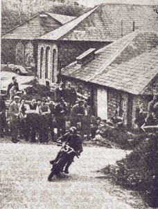 Number 37 Roland Pike passes the estate buildings at Bryanston on his way to victory in the 250 cc race