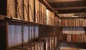 The exposed page edges of volumes is a common sight in a chained library