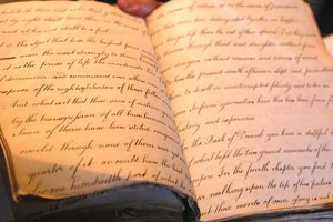 wo very different hands writing in a collected book of sermons from Wimborne Minster priests