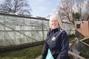 Briony Baxter outside (possibly) Dorset's only wall-to-wall carpeted greenhouse