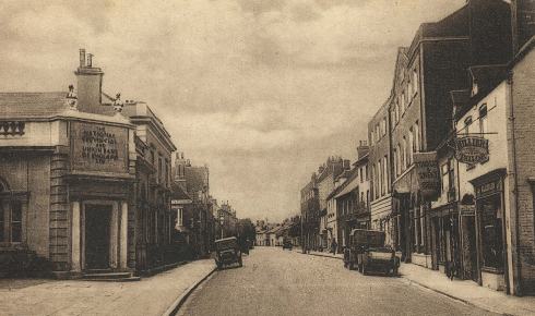 Wimborne 3 West Borough in the early years of the 20th century. On the left is the Wimborne branch of the National Provincial Bank, for which Henry Joyce worked as an adult.